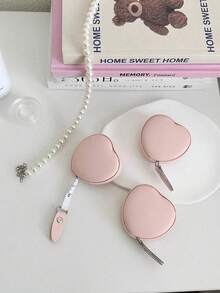 1 pieza Cinta métrica retráctil de cuero PU con forma de corazón, 150 cm (59,06 pulgadas) Regla multifuncional mini, Cinta métrica de cuero para la cintura, Portátil para uso doméstico - Rosa - Ver 4