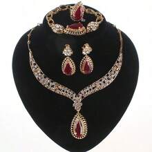 Juego de joyas de lujo con tono dorado y cristal rojo en forma de lágrima, que incluye collar, aretes, pulsera y anillo para mujeres, ideal para bodas, fiestas nupciales y bailes - juego de 4 piezas - Ver 13