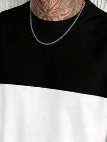 男士休闲黑白拼接短袖T恤，日常穿着、休闲通勤皆宜。 - 黑與白 - 查看 5