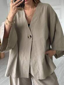 Bộ đồ nữ thường ngày gồm áo cổ chữ V dáng rộng và quần ống rộng, chất liệu vải dệt màu trơn, thích hợp cho mùa hè và mùa xuân. - Xám - Xem 5