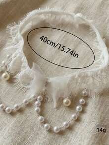 新娘吊袜带，配有可爱蝴蝶结、蕾丝和性感珍珠腿链，大腿吊袜带 - 白色 - 查看 6