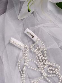 1条2.5米长薄纱围巾披肩，V领设计，饰有珍珠链，简约优雅，是女士婚纱的理想配饰，也适合正式场合、晚宴和派对。 - 彩色 - 查看 5