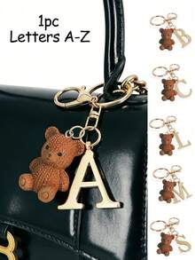 优雅金色字母钥匙扣，配有泰迪熊吊坠，3D A-Z字母吊坠，时尚合金钥匙圈，背包挂饰，汽车钥匙链，经典简约钥匙扣，适合女性，可作装饰品，包包配件，送给朋友、家人、情侣、女友的绝佳礼物，适合重要场合、情人节。 - 彩色 - 查看 1