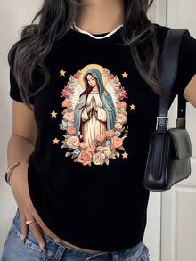 Figura sagrada envuelta en un resplandor celestial rodeada de flores rosadas y estrellas doradas que simbolizan esperanza y serenidad camiseta de mujer 220g casual moderna confortable - Negro - Ver 1