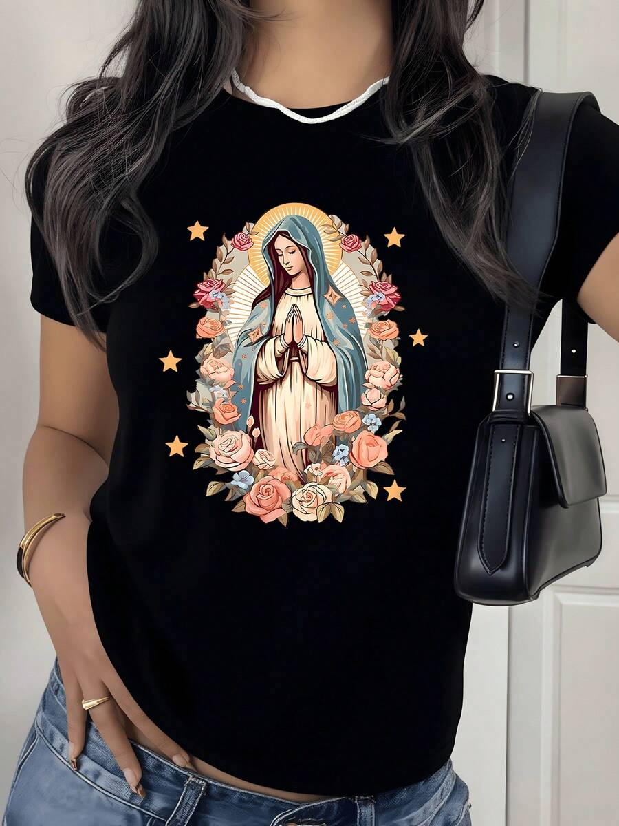 Figura sagrada envuelta en un resplandor celestial rodeada de flores rosadas y estrellas doradas que simbolizan esperanza y serenidad camiseta de mujer 220g casual moderna confortable - Negro - Ver 1