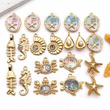 1件金色不锈钢海洋动物吊坠，天然贝壳镶嵌，包含贝壳螃蟹、海星等吊坠，可用于制作项链、手链、耳环，打造海洋主题珠宝，亦可作为DIY礼物。 - 彩色 - 查看 2