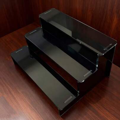 1 pieza Estantería escalonada acrílica negra de 3 niveles, material de alta transparencia, estructura resistente sin montaje, adecuada para botellas de perfume, cosméticos, lápices labiales, esmalte de uñas, cajas de almacenamiento de maquillaje, exhibición de colecciones, decoración minimalista moderna de tocador, organizador de escritorio de oficina, soporte de exhibición, vitrina de varias capas, caja de almacenamiento transparente, organizador a prueba de polvo, exhibición de escritorio para el hogar