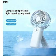 1个迷你手持式电池风扇，使用2节AAA电池供电（不含电池），配有挂绳。风扇运行时间取决于电池容量。 - 手持 - 查看 4