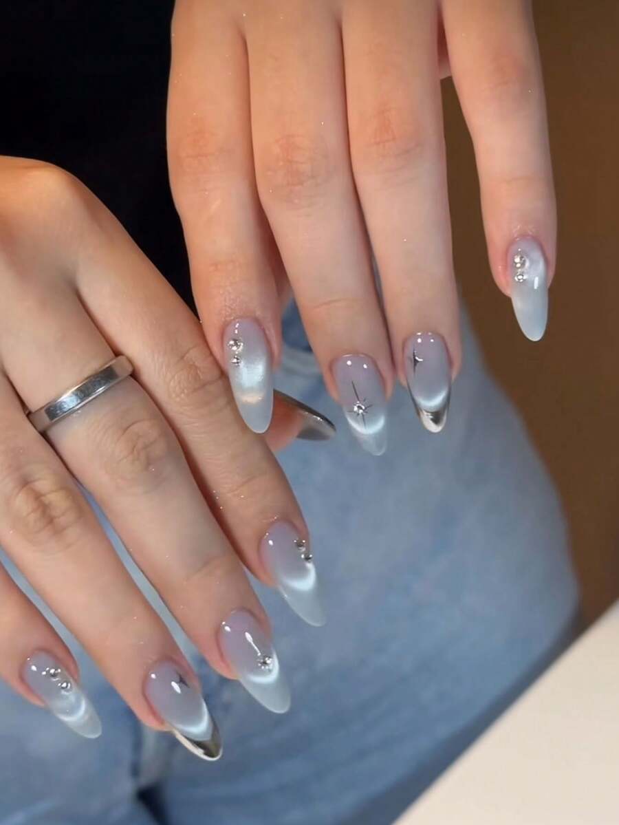 10pcs Handmade Almond-Shaped Silver Metal Nail Stickers, French Pointed Design, Light Blue Cat Eye Effect, Silver Star Diamond Accents. Fashionable Luxurious, High-End. Suitable For Various Occasions To Match Different Outfits. Easy To Apply And Remove, One-Click Nail Art - Baby Blue - View 1