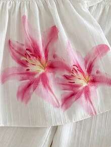 Bộ đồ bé gái in họa tiết hoa ly và sọc kẻ, gồm áo tay ngắn nhún bèo nhẹ nhàng và quần ống rộng, trang phục thường ngày/du lịch tươi mát và thanh lịch, thích hợp cho mùa hè. - trắng - Xem 3