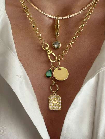 1pc Elegant & Delicate Women's Gold Pendant Necklace, Composed Of 26 Letter Pendants, 1 Green Teardrop Pendant, 1 Gold Circle Pendant, And 1 Lobster Clasp. The Necklace Features A Stylish Gold Horseshoe Clasp Design, Suitable For Daily Wear Or As A Gift For Friends And Family.