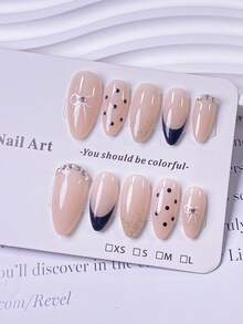 10片手工制作杏仁形黑色假指甲，法式尖头设计，黑色波点，渐变闪粉，白色钻石点缀，手绘白色蝴蝶结。简约多用途设计，时尚奢华高端质感。易于佩戴和卸除，方便打造各种美甲造型。 - 黑色 - 查看 2