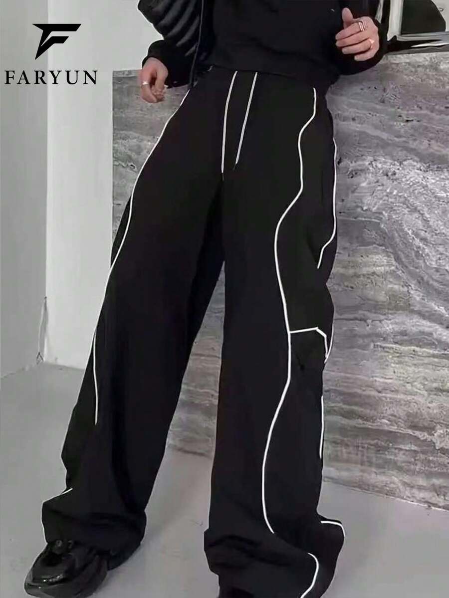 Quần dài nam dáng casual có dây rút ở eo, phối màu tương phản với túi hai bên, phù hợp cho đi làm hàng ngày và phong cách đường phố, kiểu dáng xuân hè. - màu đen - Xem 1