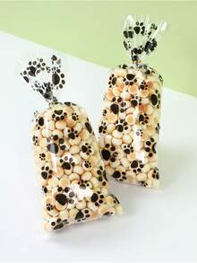 50pcs Plastic Paw Print Gift Bags With Twist Tie, Pet Treats Candy Bags, Portable Pet Bags, Puppy Paw Print Pattern Gift Packaging Bags, Pet Decoration, Baby Shower Party Decoration, Gender Reveal Party Decoration, Puppy Birthday Party Decoration, Dog Paw Print Gift Packaging Bags, Puppy Paw Print Cookie Baking Bags, Plastic Bags, Shopping Bags, Pet Theme Party Supplies, Holiday Party Supplies, Party Favors - Black and White - View 9