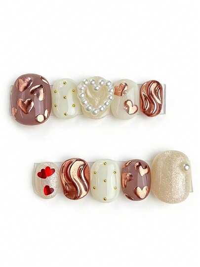 10pcs It's Named Chocolate Heart Crimson Sequence. This Manicure Showcases A Seamless Blend Of Dusty Mauve And Milky White, Where The Rose Gold Heart And Pearl Details Pop Against The Soft Base Like A Heart Fluttering Over Golden Sand. The Red Heart And Wavy Texture Accents Add A Touch Of Playful Luxury, Creating A Dreamy, Nostalgic Look.