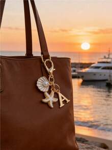 1 Bohemian-Style Golden Letter Keychain With Shell And Starfish Decorations, A-Z Letter Options-Perfect For Holiday And Beach Themes. Ideal Gift Or Decoration For Backpacks, Purses, And Handbags! A Great Gift For Friends, Classmates, And Loved Ones,Easter, Mother'S Day, Independence Day, Wedding Season, Graduation Season Gifts - View 2
