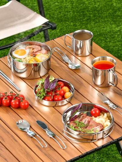 Bộ dụng cụ nấu ăn bằng thép không gỉ, gồm bát và nồi di động, thích hợp cho nấu ăn ngoài trời khi cắm trại.