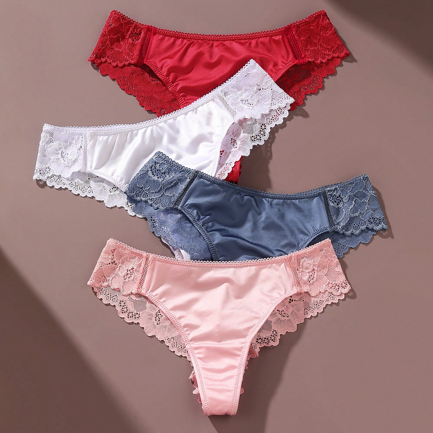 Set de 4 bragas de satén brillante con borde de encaje de talle bajo para mujer