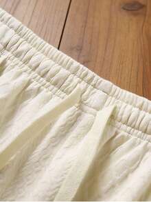 Bộ áo polo và quần short nam bằng vải jacquard có họa tiết, thích hợp mặc đi làm và đi nghỉ mát. - Màu be - Xem 7