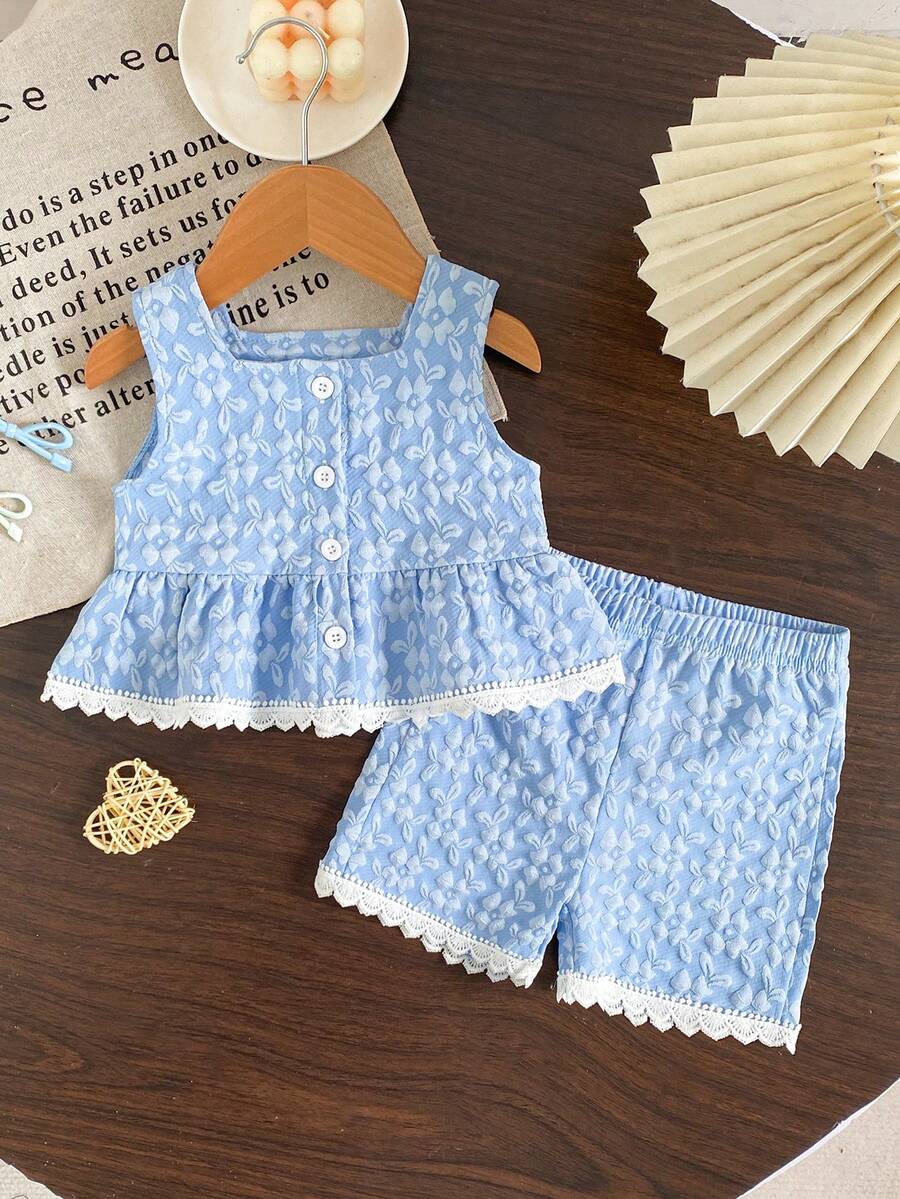 Bộ đồ thường ngày dễ thương cho bé gái, áo không tay vải jacquard màu xanh dương có họa tiết phối cùng quần short màu xanh navy viền ren trắng, bộ 2 món. - Màu xanh lam - Xem 1
