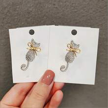 1 pieza Broche de silueta de gato lindo y creativo, broche de abrigo versátil y clásico, accesorio antideslizante - Multicolor - Ver 9