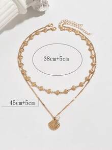 Bộ 2 dây chuyền vỏ sò và vàng phong cách đại dương mùa hè dành cho tuổi teen, mặt dây chuyền ngọc trai giả thời trang, phù hợp để đeo hàng ngày, đi nghỉ mát, đi biển, trang trí chụp ảnh. Dây chuyền thủ công có thể cắt theo độ dài mong muốn, số lượng vỏ sò có thể khác nhau. - Vàng - Xem 6