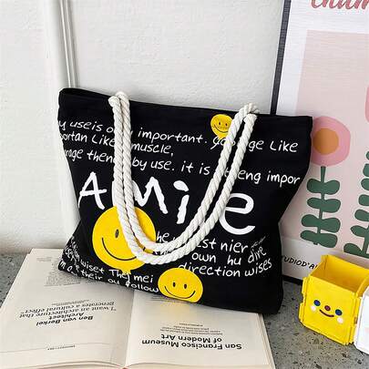 1Pc Smile Face Print Black Canvas Tote Bag, Rope Shoulder Strap Large Capacity Shoulder Bag, Casual Commuter Handbag Shopping Bag, Student School Bag, Daily Casual Underarm Bag, Soft Canvas Wear-Resistant Computer Bag, Open Closure, Korean Ins Style, For Daily Commute, School, Shopping, Travel, Unisex