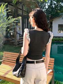 Áo tank top không tay dáng ngắn cổ chữ V xếp ly, ôm sát, đa năng dành cho nữ, mẫu mới mùa hè 2026. - Xám - Xem 7