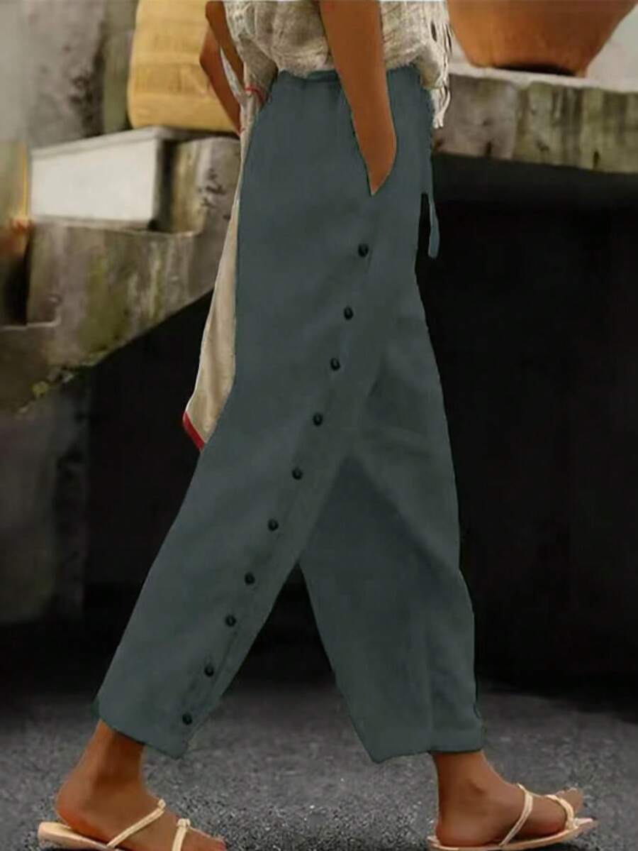 Pantalones casuales de mujer de unicolor con cintura elástica, cordón, botones laterales y bolsillos parche, adecuados para uso diario, en casa y en exteriores. Primavera - Verde Oscuro - Ver 1