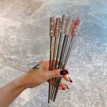 一套奢华水钻装饰筷子，防滑耐热，适用于家庭、酒店、户外、旅行、婚礼、生日、节日等场合。镶嵌钻石、宝石等装饰珠宝艺术品。 - 查看 8
