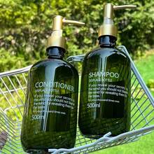 16.91盎司六件套深绿色洗护套装 - 印有文字图案，包含可互换的洗发水、护发素和沐浴露，配备防漏泵头和斜肩设计 - 查看 7