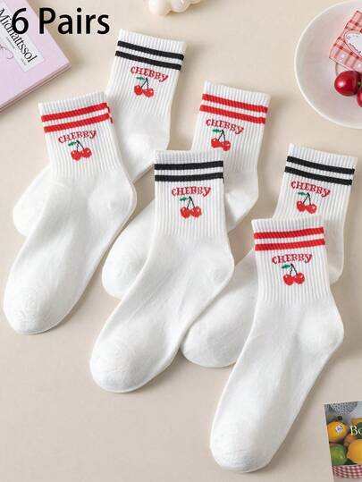 6 paires de chaussettes blanches pour femmes, avec un motif de cerises mignon et des rayures stylées dans un style preppy. Chaussettes mi-mollet douces et confortables pour le port quotidien et l'exercice