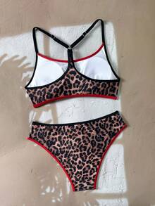 Bộ bikini hai mảnh họa tiết da báo, phối nhiều mảnh, kiểu dáng casual, khóa cài, viền tương phản, hở lưng, thích hợp cho kỳ nghỉ hè đi biển. - Nhiều màu - Xem 7