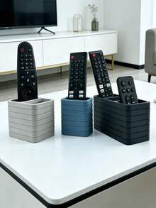 1个现代遥控器收纳架 - 适用于电视/DVD/蓝光/音响系统/游戏机 - 客厅/卧室媒体收纳架 - 带储物空间的装饰性遥控器收纳盒 - 无需电源，易于使用，耐用塑料收纳盒可容纳1/2/3个遥控器 - 查看 1