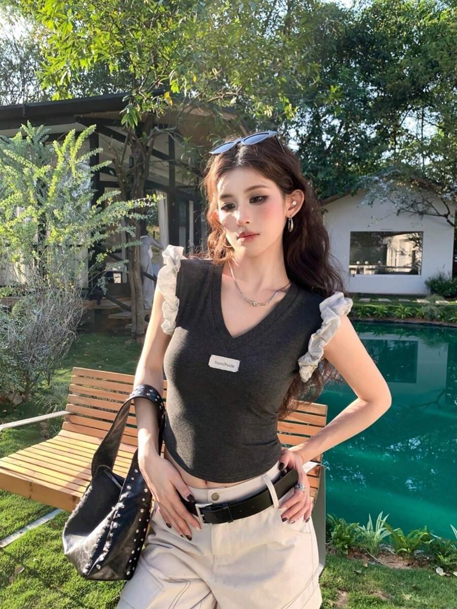 Áo tank top không tay dáng ngắn cổ chữ V xếp ly, ôm sát, đa năng dành cho nữ, mẫu mới mùa hè 2026. - Xám - Xem 1