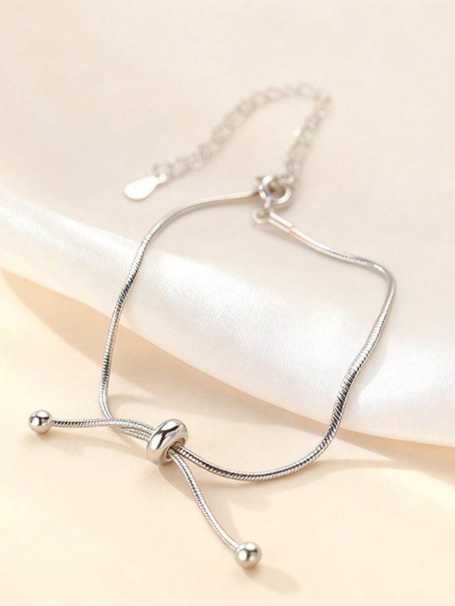 1 Peça de Pulseira de Contas de Osso de Cobra com Empurrar-Puxar Elástico para Mulheres, Joia Personalizada Simples e Versátil. O estilo é simples e elegante, adequado para qualquer roupa e ocasião. É perfeito para o transporte diário, viagens casuais e encontros, embelezando facilmente o pulso e realçando a elegância geral do visual. - Prata - Visão 1