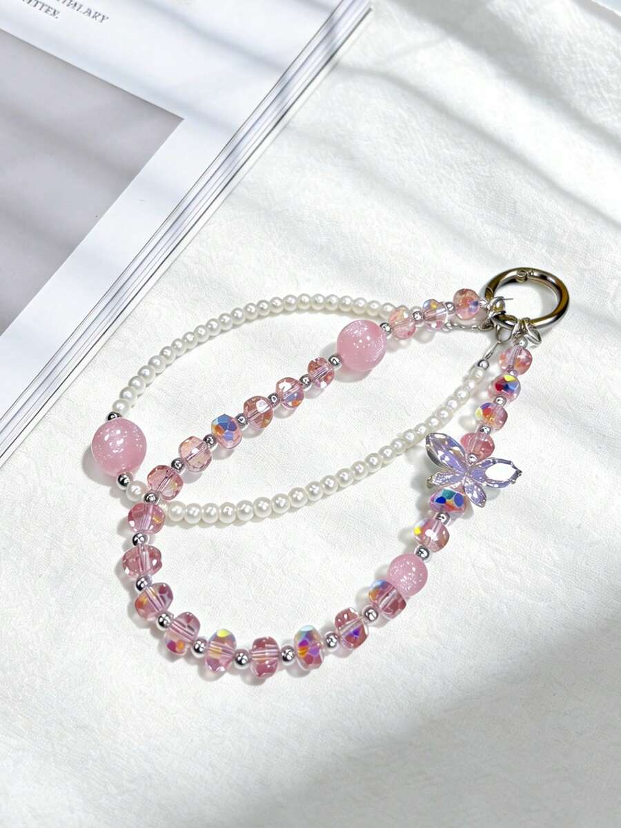 1件粉色蝴蝶珍珠闪亮钻石手机挂件 - 手工串珠手机链，相机防丢链，旅行防丢手机链，包包挂件，钥匙扣，适用于苹果iPods Pro蓝牙耳机盒，节日礼物（女士款） - 彩色 - 查看 1