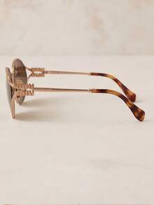 Miu Miu 黑色椭圆形镜框金色Logo防紫外线时尚女士太阳镜，夏季海滩风 - 黑色 - 查看 5