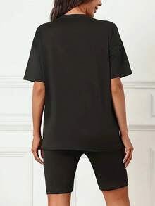 Conjunto de Yoga para Mujer Camiseta de Cuello Redondo y Shorts Deportivos Suave y Elástico Confortable para Ejercicio Gimnasia Pilates Entrenamiento al Aire Libre Actividad Física Ropa Deportiva Lige - Negro - Ver 3