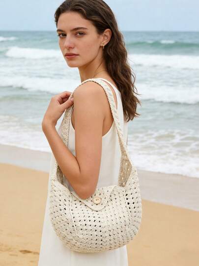 1个极简镂空钩编单肩包，休闲风格，便携设计，适合海滩、旅行、聚会等场合，是送给女性的绝佳礼物。