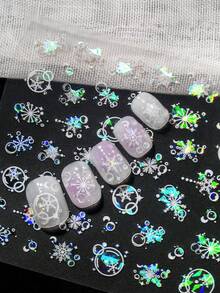 一张梦幻冬日美甲贴纸，饰有雪花和透明气泡，采用全息虹彩效果，折射出迷人的彩虹色调，搭配精致的透明气泡和圣诞装饰，整体设计散发出梦幻般的冬日气息和节日氛围。梦幻浪漫的风格，璀璨夺目，是喜爱冬日美学、圣诞节庆典和奇幻之美人士的理想之选。 - 彩色 - 查看 10