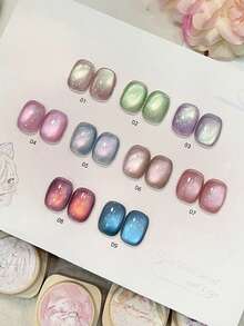 奈仕指甲油 12毫升 容量 2026 新款情人节礼物，春夏新款，甜美糖果色系，缤纷美人鱼蓝、绿、紫、粉，玻璃珠点缀，梦幻极光猫眼凝胶指甲油。亮丽色彩，适合夏秋两季，磁性指甲贴片，需搭配底油和封层使用，需配合UV灯固化。植物基凝胶，9色套装，适合新手，居家、办公、通勤、约会等各种场合。畅销沙龙品质，持久长达28天。 - 彩色 - 查看 5