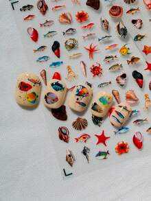 1张海洋主题美甲贴纸，包含贝壳、海星、热带鱼、章鱼和其他海洋生物，适合打造夏日、海滩、清新或度假风美甲，是日常穿搭、约会、派对、海滩旅行的理想之选，尤其吸引热爱自然和海岛风情的年轻人。 - 彩色 - 查看 2