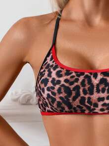 Bộ bikini hai mảnh họa tiết da báo, phối nhiều mảnh, kiểu dáng casual, khóa cài, viền tương phản, hở lưng, thích hợp cho kỳ nghỉ hè đi biển. - Nhiều màu - Xem 4