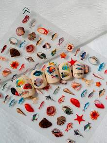 1张海洋主题美甲贴纸，包含贝壳、海星、热带鱼、章鱼和其他海洋生物，适合打造夏日、海滩、清新或度假风美甲，是日常穿搭、约会、派对、海滩旅行的理想之选，尤其吸引热爱自然和海岛风情的年轻人。 - 彩色 - 查看 6