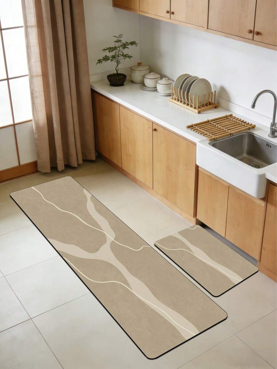 1 tấm thảm bếp bằng gel silica, nền màu kaki nhạt với kết cấu mịn như đá, kết hợp với hai đường lượn sóng màu trắng sữa mượt mà, tạo nên họa tiết Wabi-Sabi đơn giản, nhẹ nhàng và tự nhiên. Thảm bếp cao cấp thời trang, êm ái và chống mỏi, chất liệu vải bề mặt, lớp xốp thấm hút ở giữa. - Nhiều màu - Xem 1