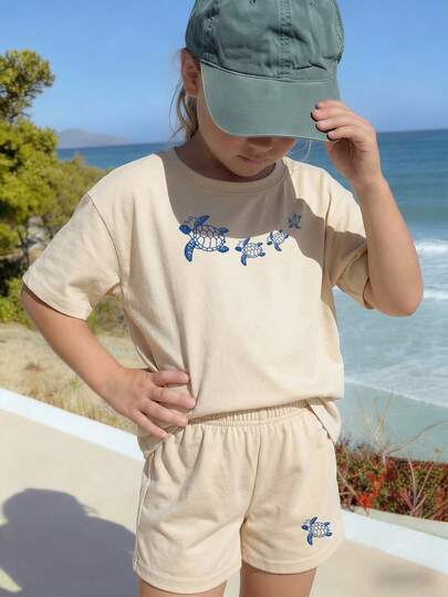 2-delige set voor tienermeisjes: casual abrikooskleurig T-shirt met korte mouwen en short, kleurrijke zeeschildpadprint, kinderkleding