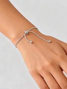1 Peça de Pulseira de Contas de Osso de Cobra com Empurrar-Puxar Elástico para Mulheres, Joia Personalizada Simples e Versátil. O estilo é simples e elegante, adequado para qualquer roupa e ocasião. É perfeito para o transporte diário, viagens casuais e encontros, embelezando facilmente o pulso e realçando a elegância geral do visual. - Prata - Visão 5