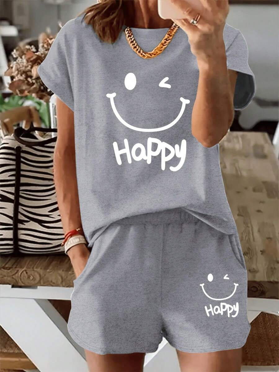 NUDEA 2025 Summer New Style, Featuring A Smiling Face And The Word 'Happy', This Casual Printed Short-Sleeve Top Comes With Elastic Waist Pocket Shorts For Women, A Two-Piece Set Summer Clothes Two Piece Set Women - Màu Xám nhạt - Xem 1