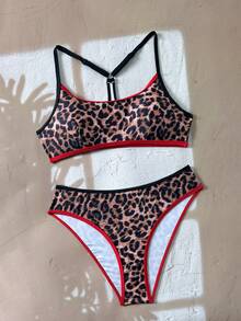 Bộ bikini hai mảnh họa tiết da báo, phối nhiều mảnh, kiểu dáng casual, khóa cài, viền tương phản, hở lưng, thích hợp cho kỳ nghỉ hè đi biển. - Nhiều màu - Xem 6